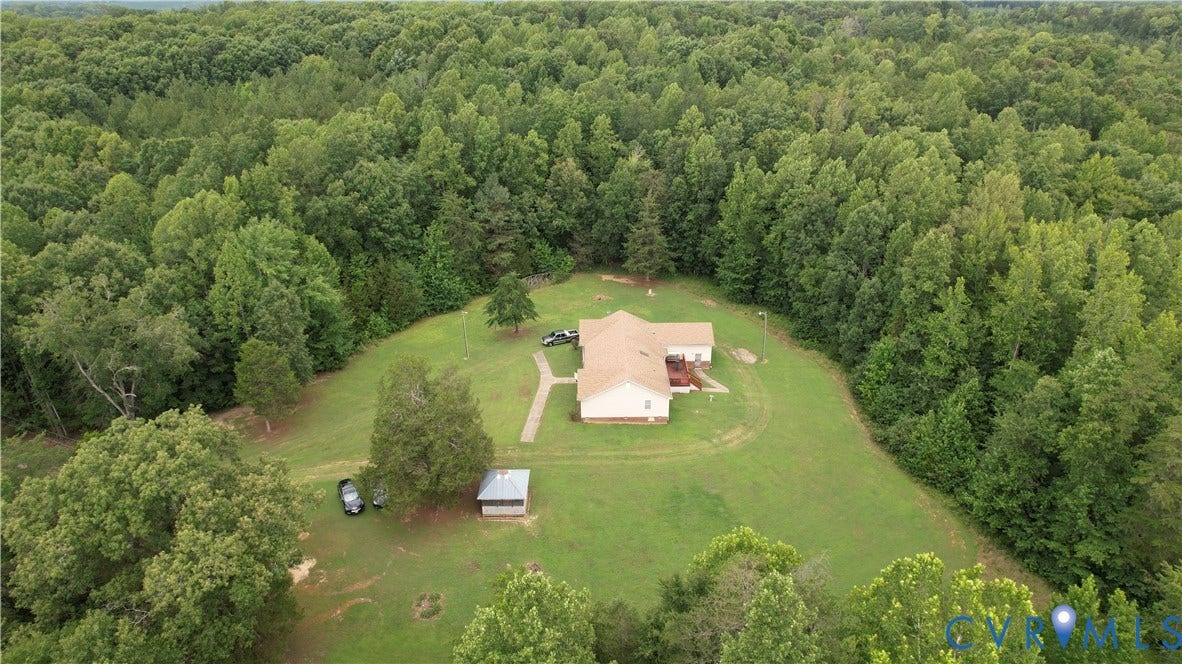 Amelia, VA 23966 Single-story residence set on a spacious, elevated grassy lot surrounded by mature trees