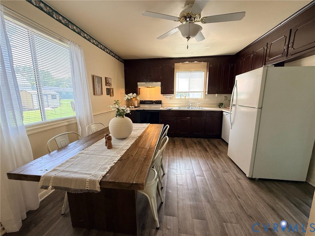 6401 Lythgoe Avenue, North Chesterfield, VA 23234 Wood-finish flooring, dark wood cabinetry, white countertops, and a ceiling fan with integrated lighting
