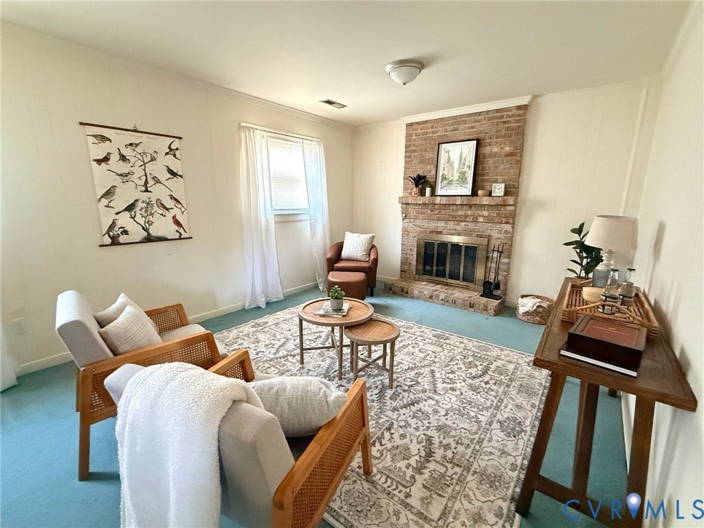 6401 Lythgoe Avenue, North Chesterfield, VA 23234 Brick fireplace with a metal insert and hearth