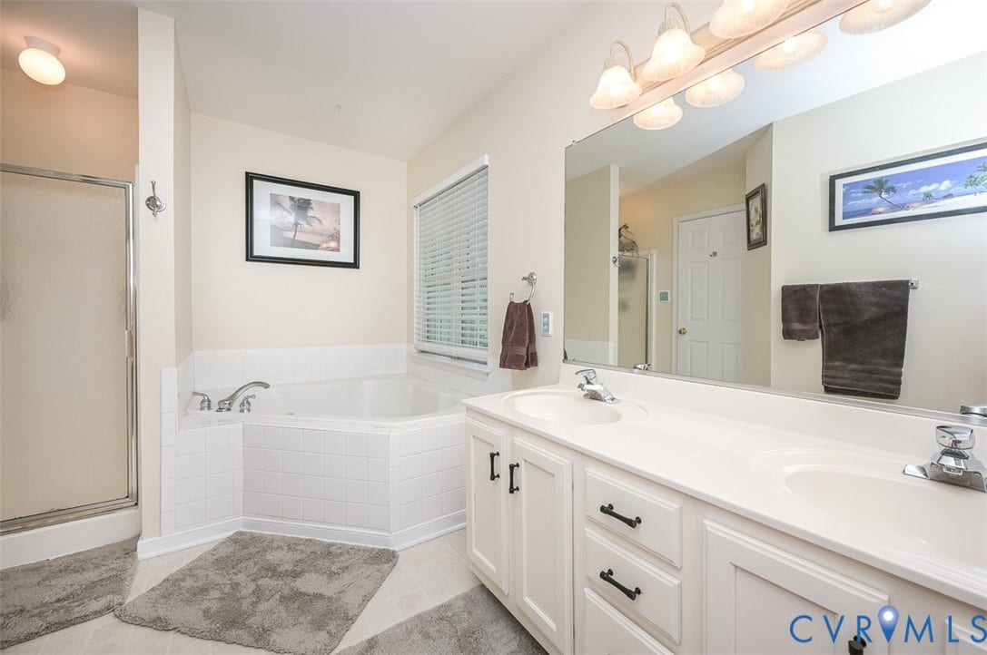9736 Cedar Grove Way, Cedar Grove, Henrico, VA 23228 Primary bath with double vanity and soaking tub.