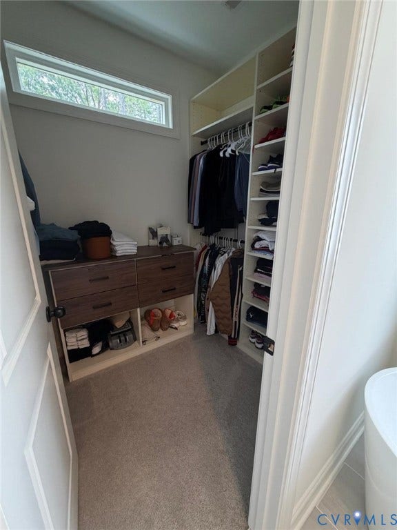 4516 Bacova Club Court, Glen Allen, VA 23059 Custom closet system with integrated shelving, hanging rods, and wood-finish drawers