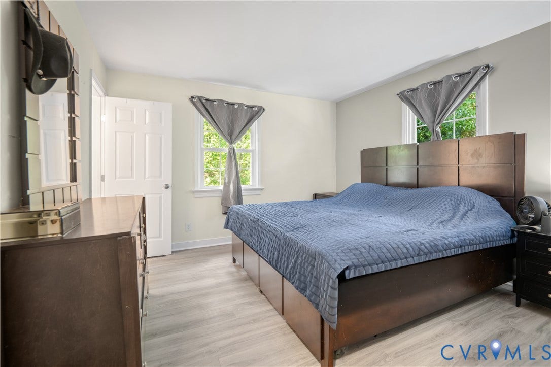 3940 Three Bridge Road, Powhatan, VA 23139 Light wood-finish flooring with white baseboards