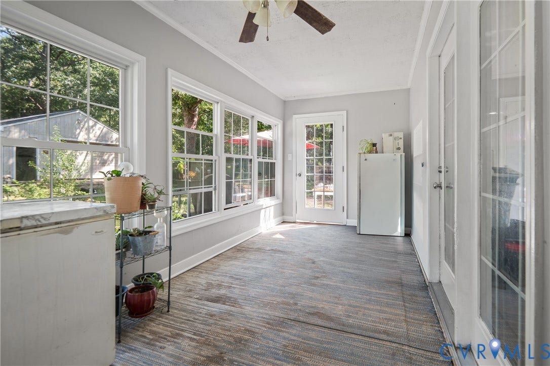 3940 Three Bridge Road, Powhatan, VA 23139 Multiple large windows, a glass-paned exterior door, and a multi-pane interior door