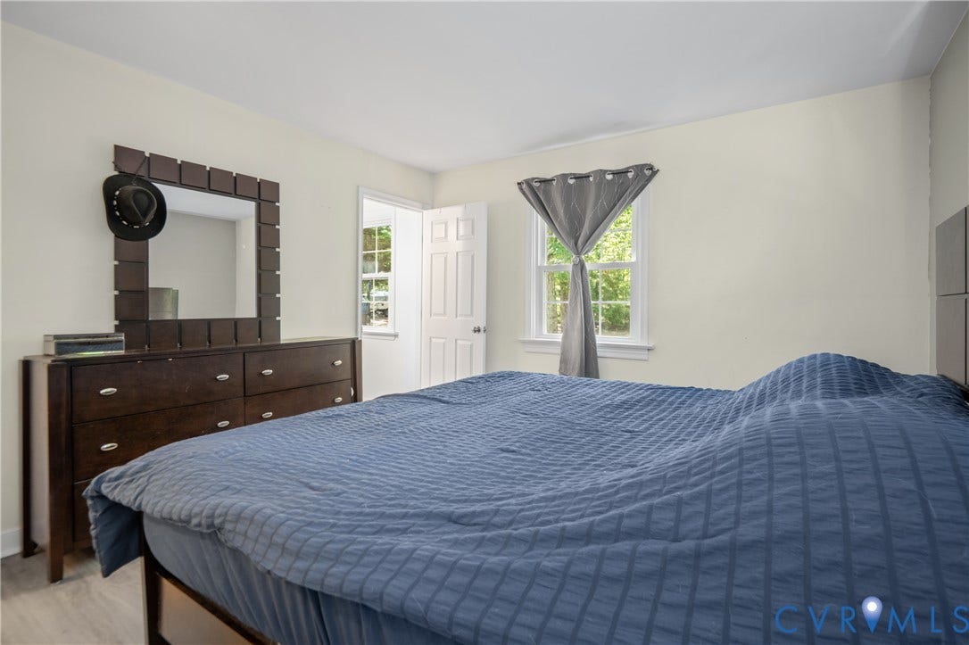 3940 Three Bridge Road, Powhatan, VA 23139 Recessed window, white interior door, and light-toned walls