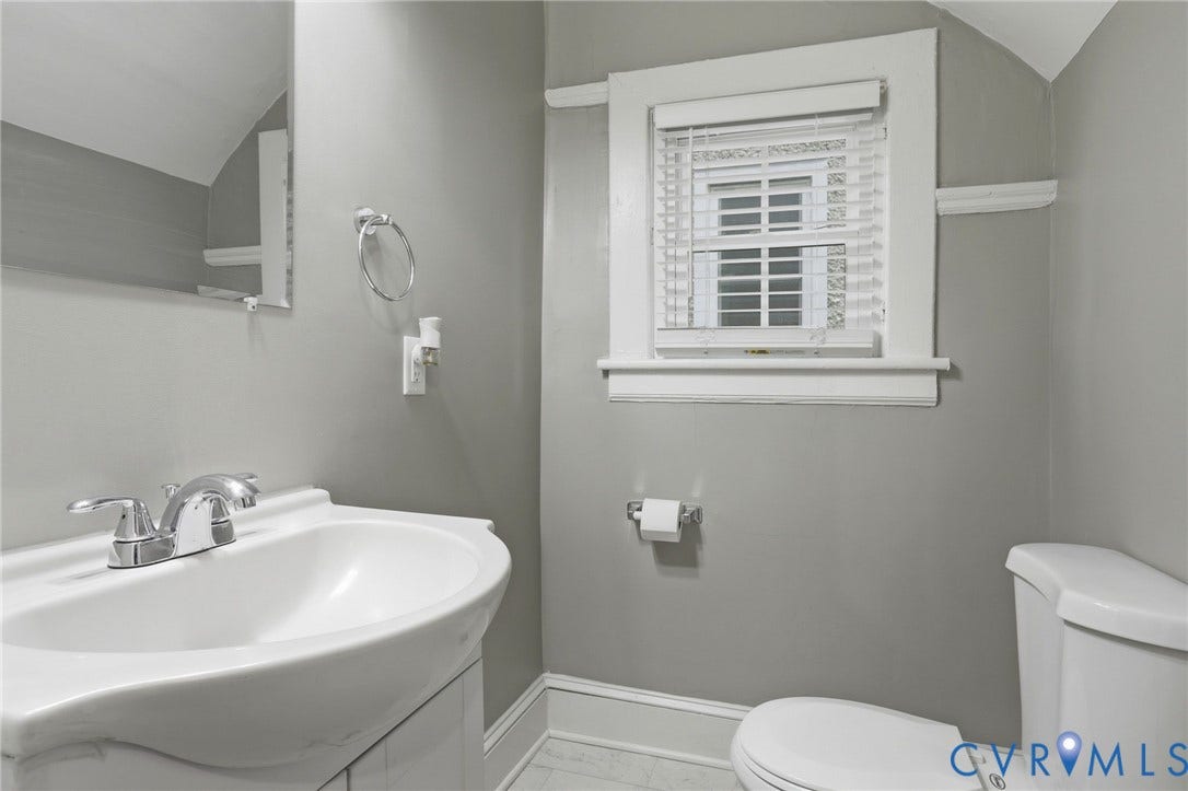 3110 3rd Avenue, North Highland Park, Richmond, VA 23222 Bathroom featuring a pedestal sink with chrome faucet, a window with white blinds, and white trim molding throughout