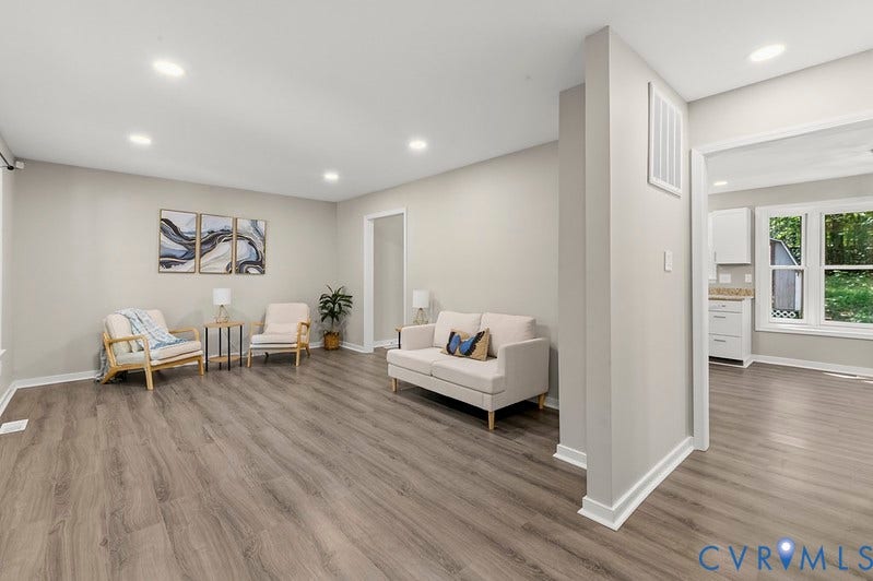 9007 Chatham Grove Lane, Richmond, VA 23236 Spacious room featuring wood-finish flooring, recessed lighting, and light-toned walls