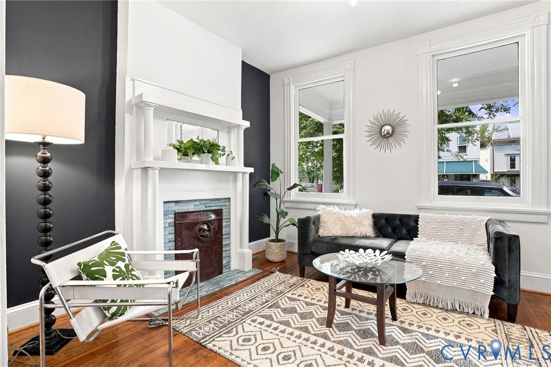 625 N 33rd Street, Chimborazo, Richmond, VA 23223 Hardwood flooring, decorative fireplace with tile surround, white trim, and tall windows