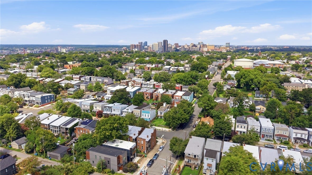 625 N 33rd Street, Chimborazo, Richmond, VA 23223 Aerial perspective of residential area with extensive tree canopy and distant skyline