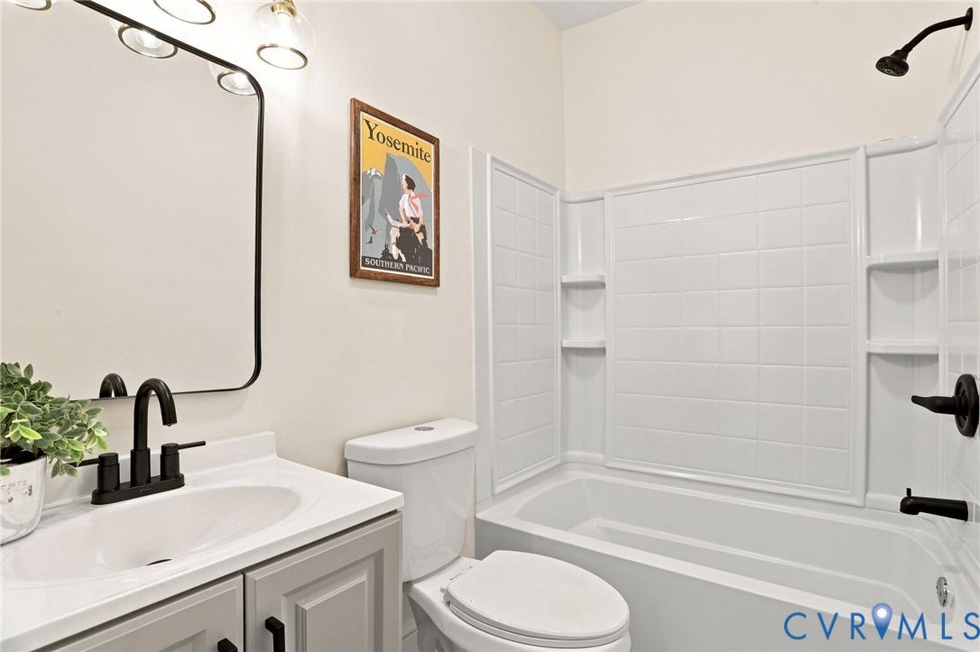 625 N 33rd Street, Chimborazo, Richmond, VA 23223 Vanity with integrated sink, matte black faucet, and white countertop