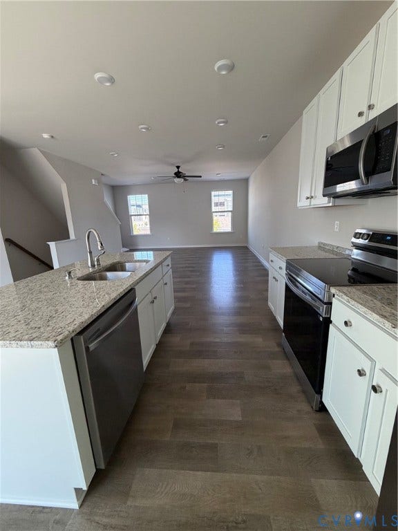 4184 Park Trail Drive, Henrico, VA 23223 Open-concept kitchen and living area featuring wood-finish flooring