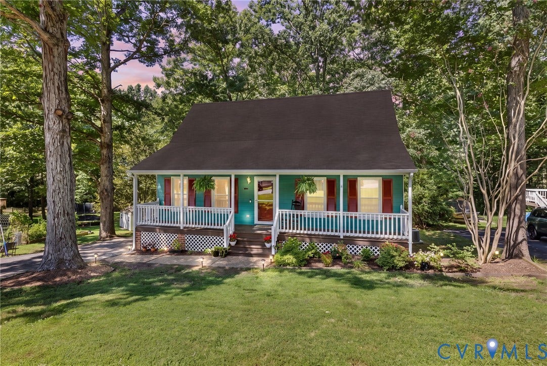 7306 Native Dancer Drive, Midlothian, VA 23112 Aqua exterior with red shutters, a dark roof, and a white railing porch
