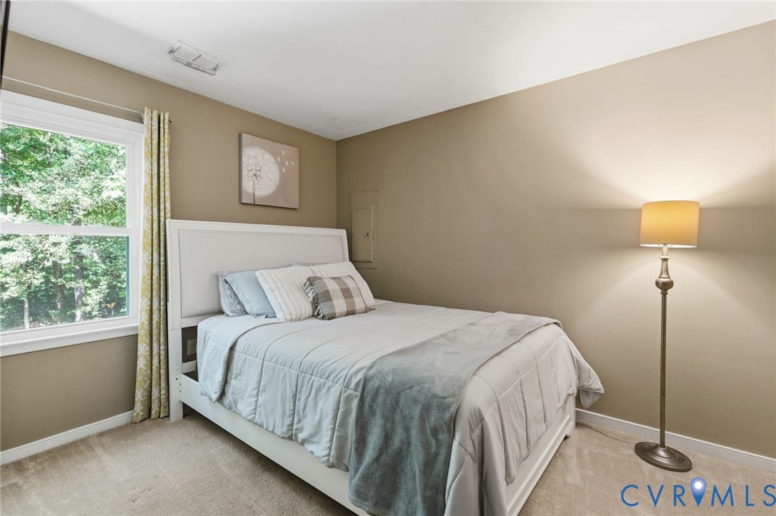 7306 Native Dancer Drive, Midlothian, VA 23112 Neutral-toned walls complement plush carpeting