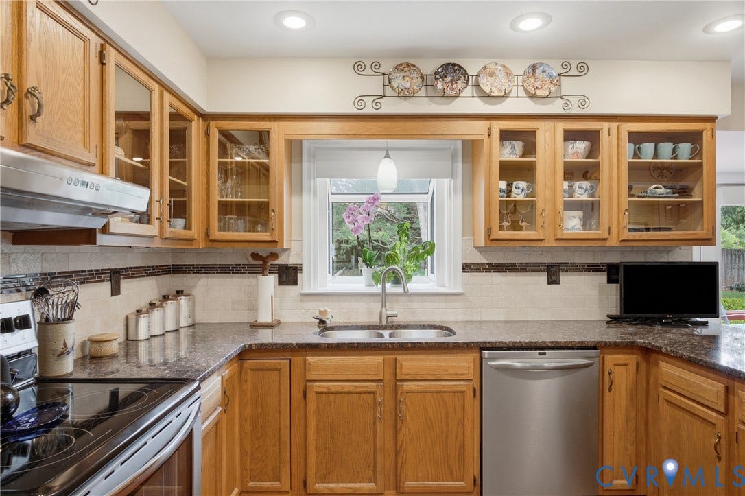 Smooth top stove and quiet dishwasher and the garden window is perfect for your house plants this winter!