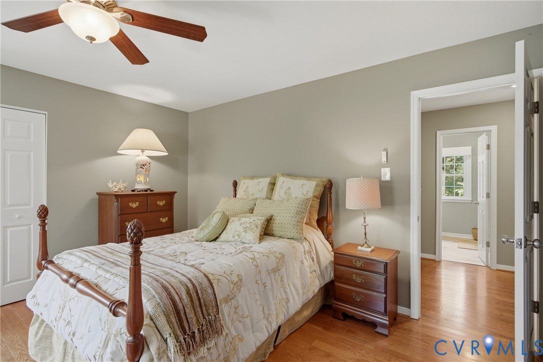 2nd Bedroom, this bedroom also features 2 closets and assess to the walk up attic