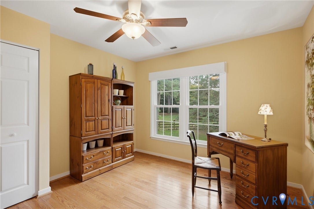 3rd Bedroom, hardwood floors, ceiling fan/light and a closet