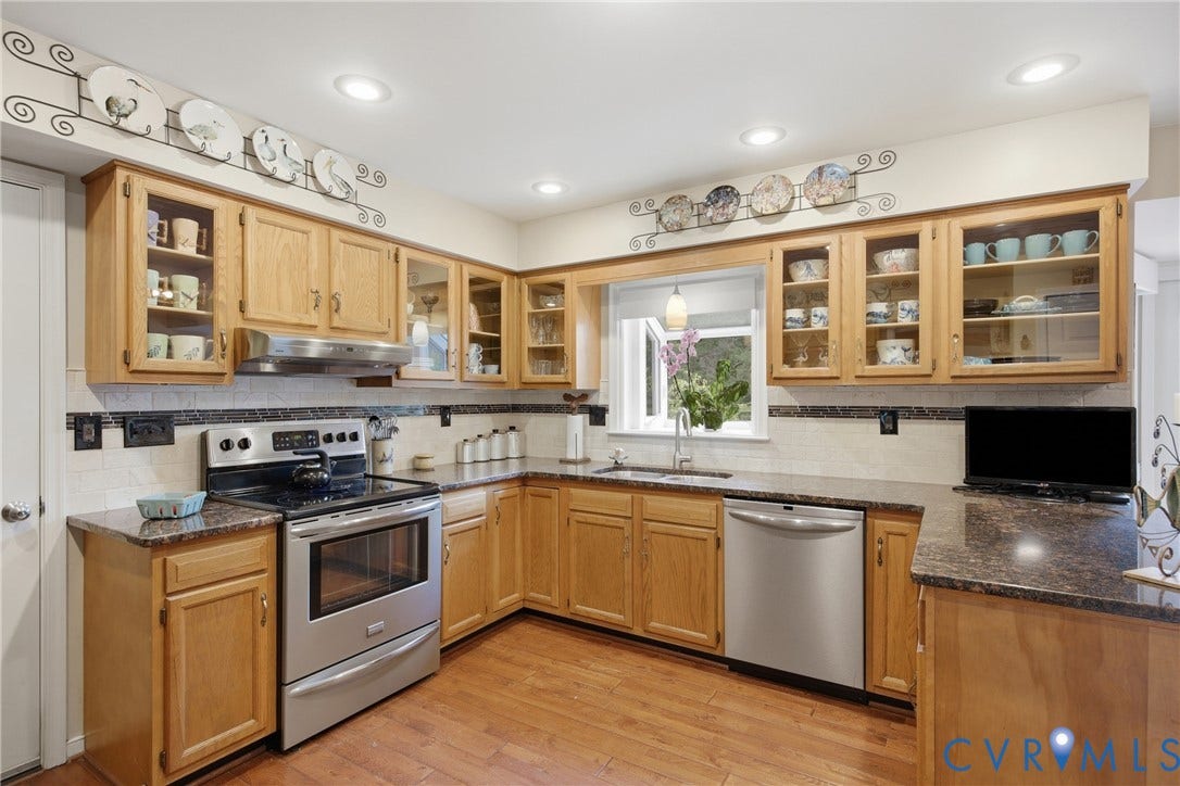 Beautiful Oak cabinets, many with glass windows!