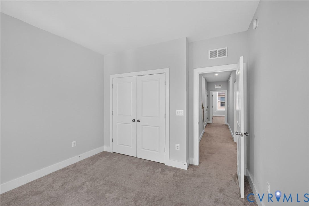 1509 Moore Street, #B, Richmond, VA 23220 Wall-to-wall carpeting and neutral gray walls