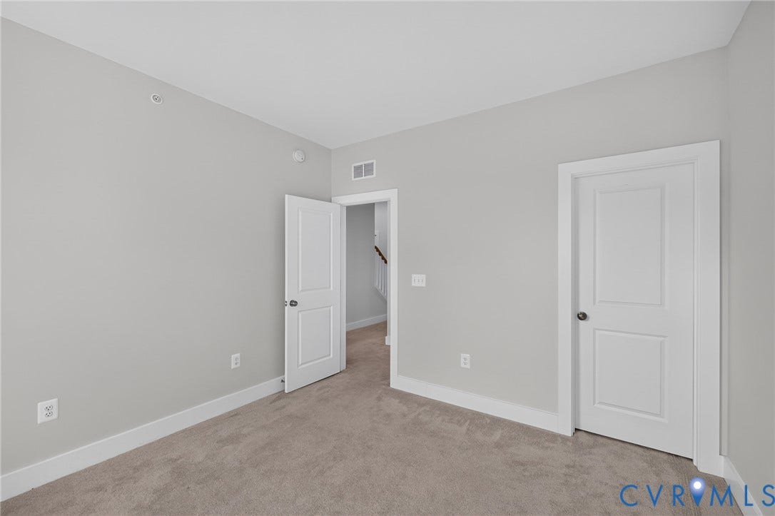 1509 Moore Street, #B, Richmond, VA 23220 Neutral wall paint, carpeted flooring, and white trim