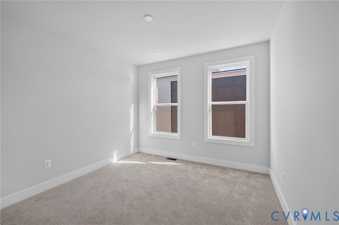 1509 Moore Street, #B, Richmond, VA 23220 Neutral-toned carpeting, recessed ceiling light, and two double-hung windows