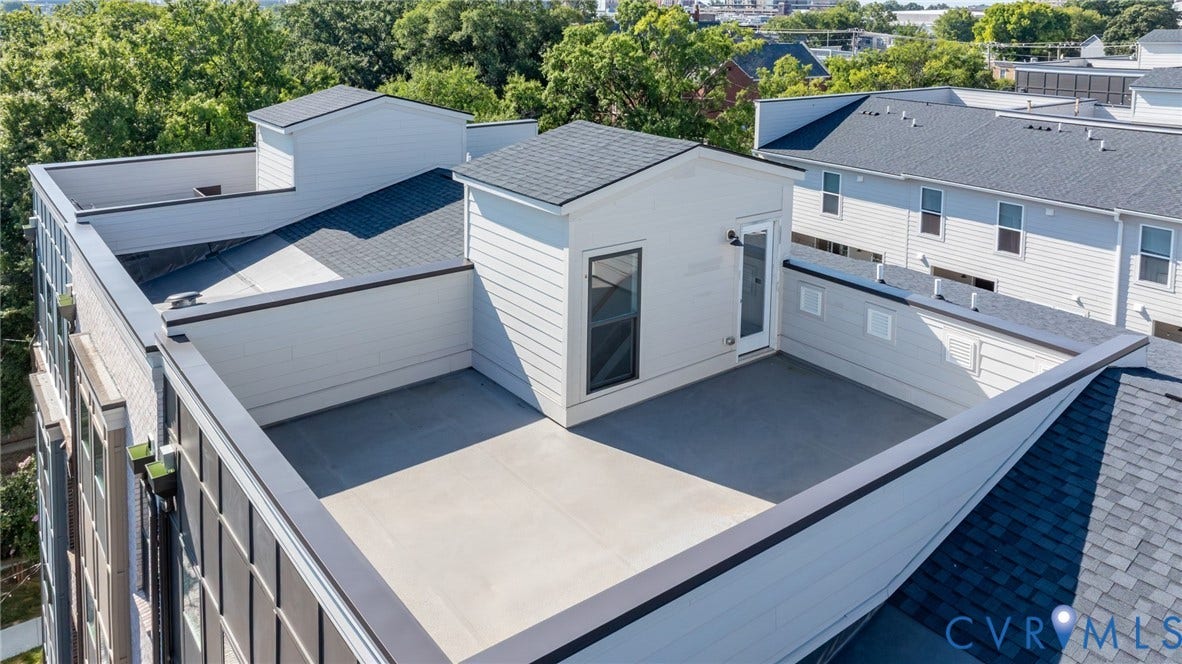 1509 Moore Street, #B, Richmond, VA 23220 Expansive rooftop terrace with a private entry door and multiple distinct patio areas