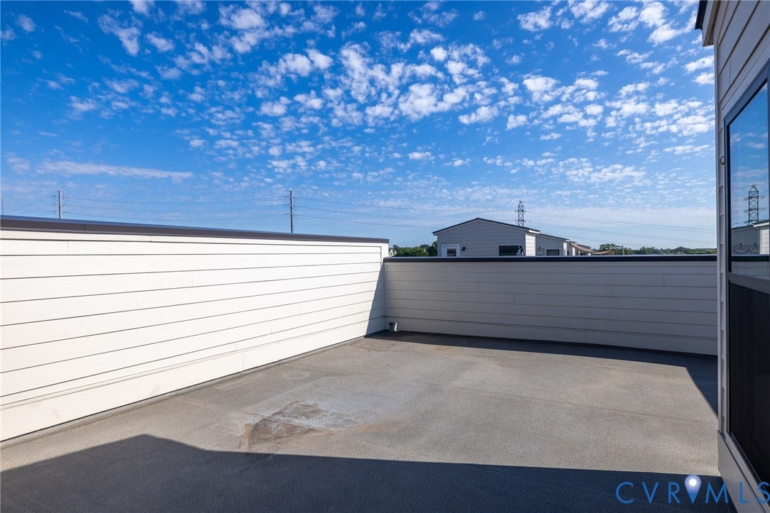 1509 Moore Street, #B, Richmond, VA 23220 Rooftop patio with white siding and dark trim