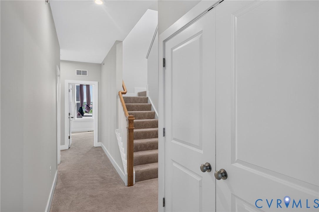 1509 Moore Street, #B, Richmond, VA 23220 Carpeted hallway with painted panel doors, light-colored walls, and recessed lighting