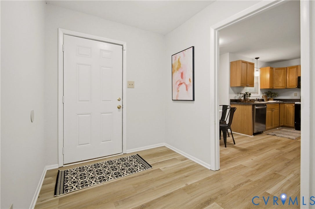2903 Fox Chase Drive, Huntsbridge, Midlothian, VA 23112 Entryway with light wood-finish flooring and a white paneled door