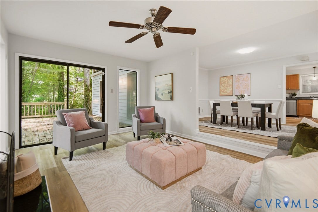 2903 Fox Chase Drive, Huntsbridge, Midlothian, VA 23112 Spacious living area featuring wood-finish flooring, a ceiling fan, and a sliding glass door opening to an outdoor deck