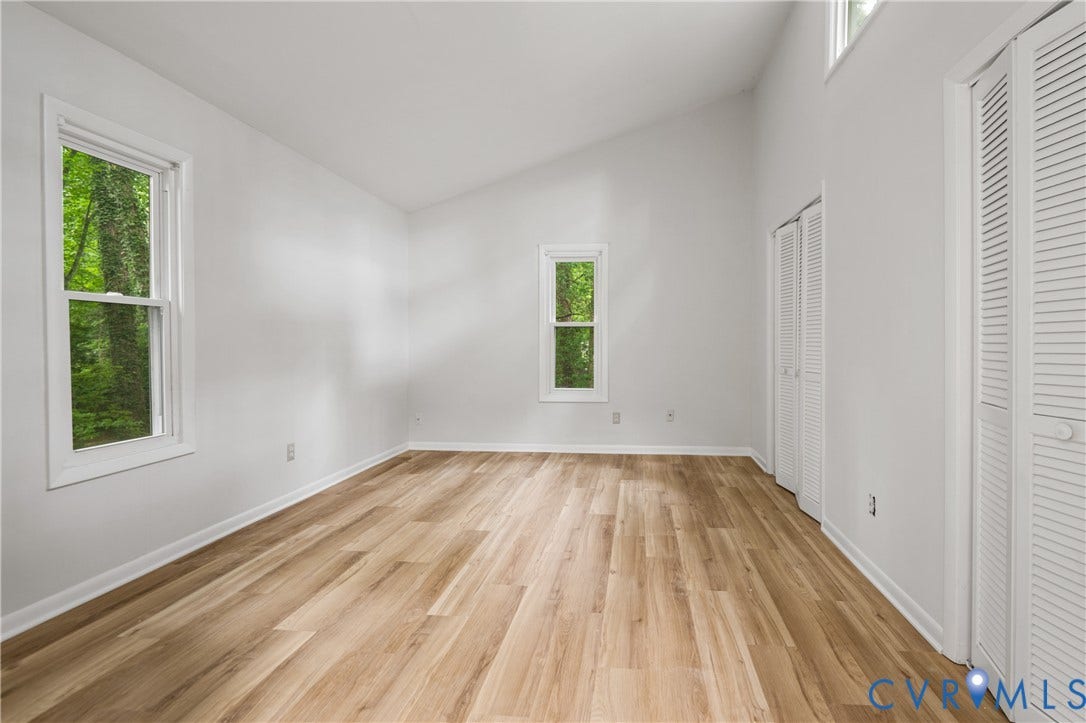 2903 Fox Chase Drive, Huntsbridge, Midlothian, VA 23112 Bright and spacious bedroom featuring gleaming wood-finish flooring, abundant natural light from dual windows, and generous square footage