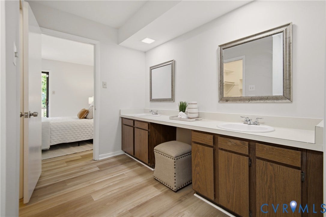 2903 Fox Chase Drive, Huntsbridge, Midlothian, VA 23112 Dual vanity with wood-finish cabinetry and white countertops