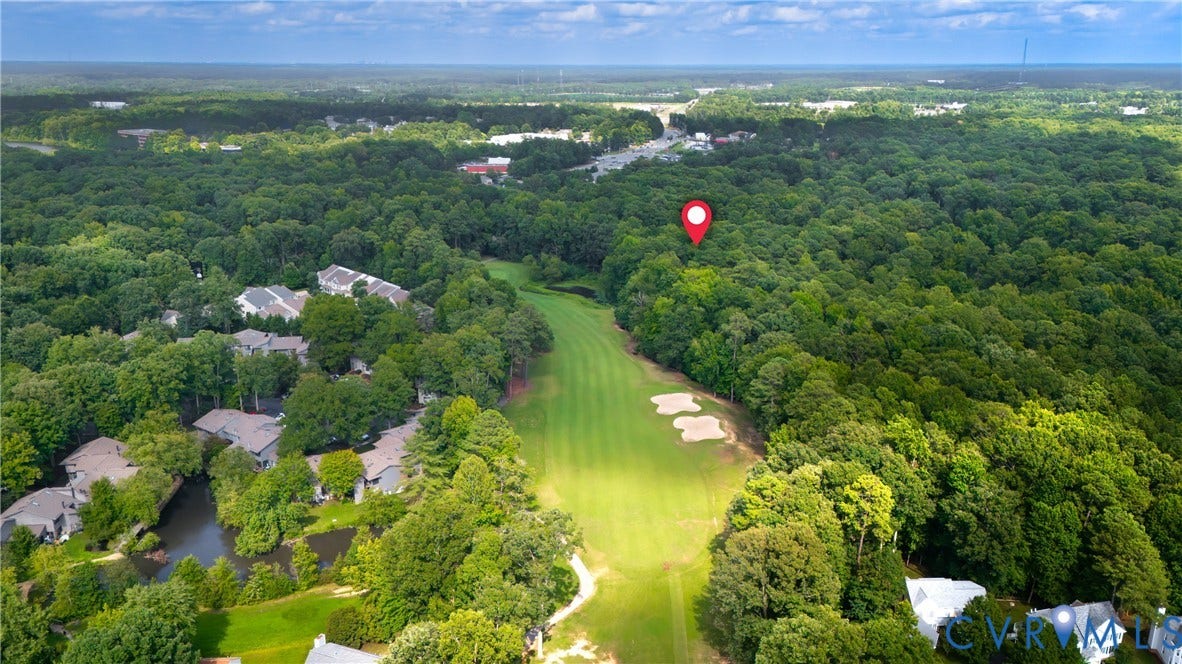 2903 Fox Chase Drive, Huntsbridge, Midlothian, VA 23112 Aerial view showcasing expansive grounds with manicured lawn, mature tree canopy, and multiple residential structures nestled throughout lush landscape