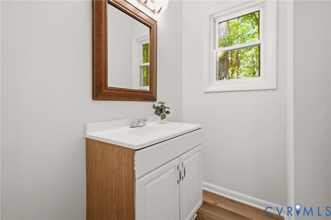 2903 Fox Chase Drive, Huntsbridge, Midlothian, VA 23112 Light-toned vanity with a white countertop and an integrated sink