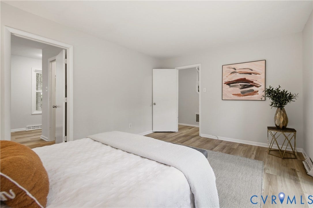 2903 Fox Chase Drive, Huntsbridge, Midlothian, VA 23112 Interior space featuring light wood-finish flooring, light grey wall paint, white trim, and white doors