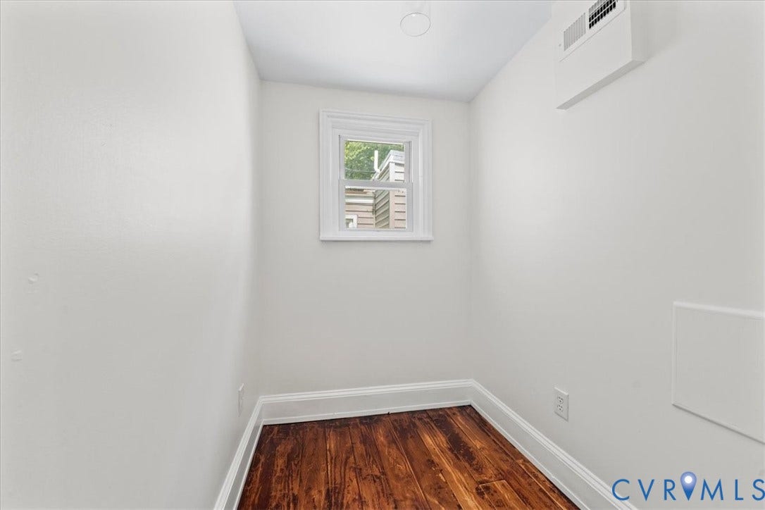 2510 E Leigh Street, Church Hill, Richmond, VA 23223 Warm wood-finish flooring, white painted walls, and a recessed ceiling light