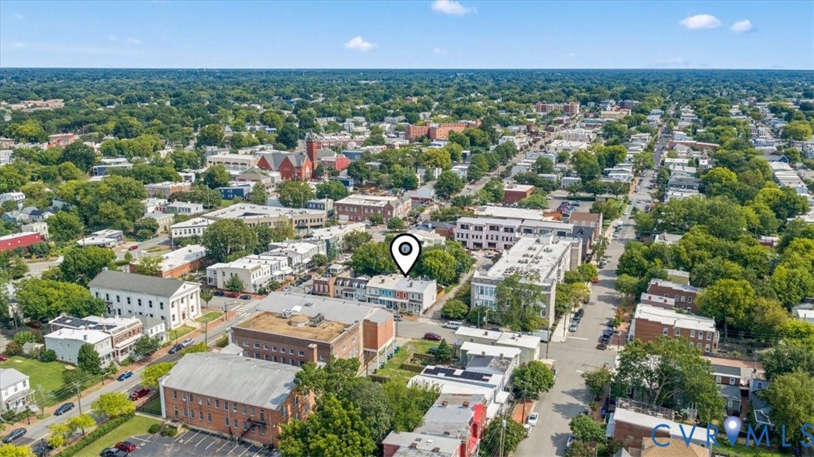 2510 E Leigh Street, Church Hill, Richmond, VA 23223 Urban neighborhood setting with diverse architectural styles and mature tree canopy