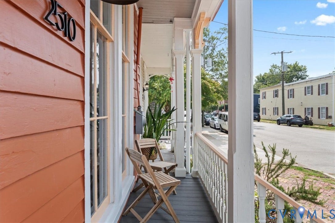 2510 E Leigh Street, Church Hill, Richmond, VA 23223 Front porch featuring wood siding, architectural columns, and a railing