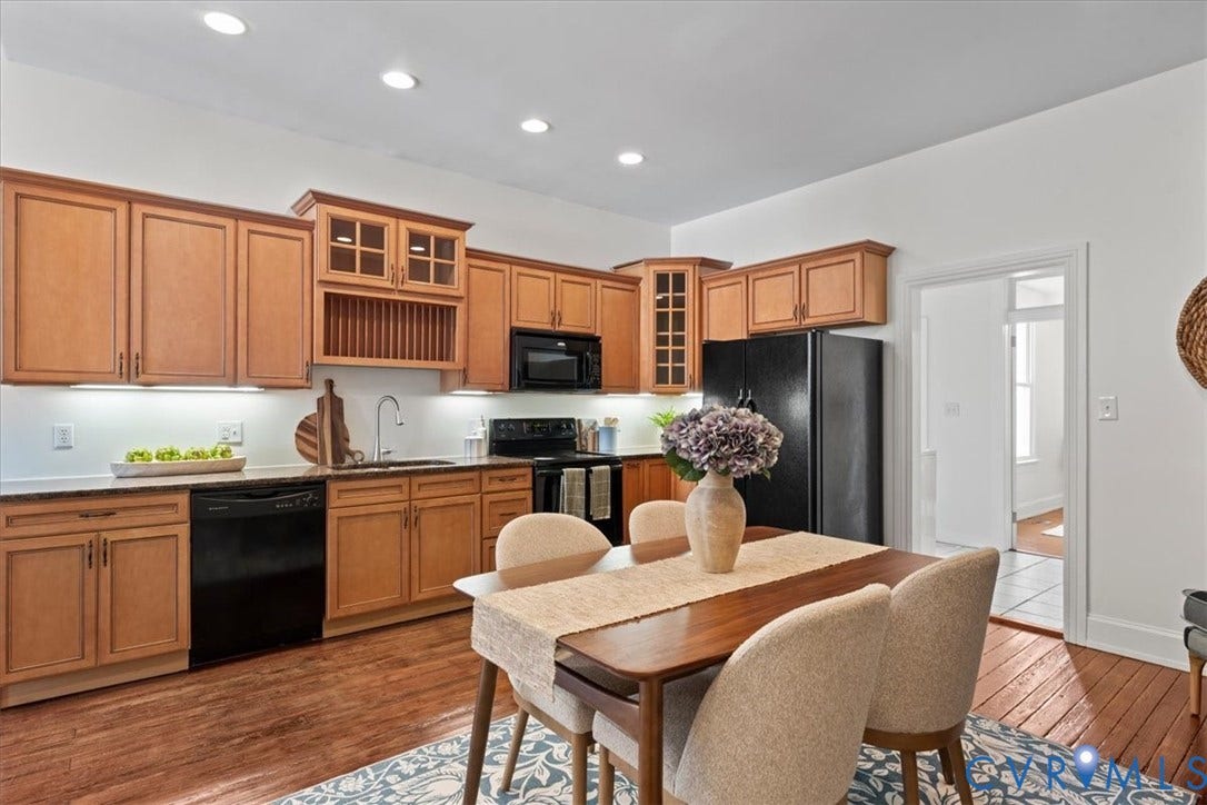2510 E Leigh Street, Church Hill, Richmond, VA 23223 Kitchen featuring wood cabinetry, black appliances, recessed lighting, and wood-finish flooring