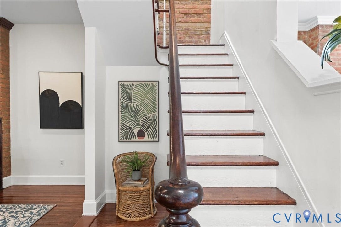 2510 E Leigh Street, Church Hill, Richmond, VA 23223 Hardwood flooring, painted risers, wood staircase treads, and a wood newel post with baluster detail