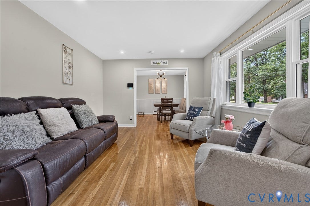 3401 Austin Avenue, Brentwood, Henrico, VA 23222 Spacious living area featuring wood-finish flooring, recessed lighting, and a large picture window