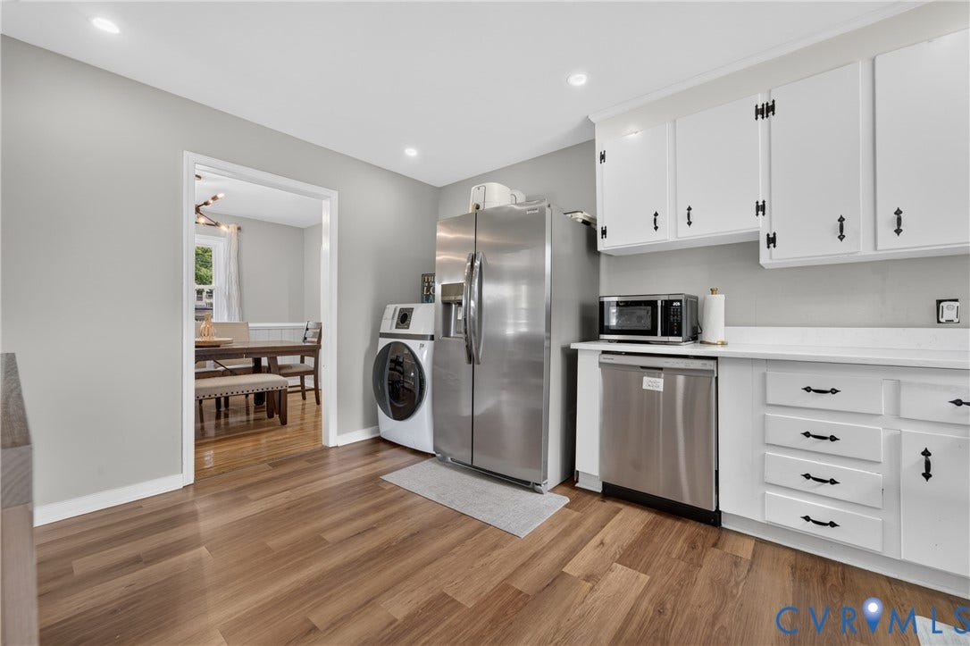 3401 Austin Avenue, Brentwood, Henrico, VA 23222 Kitchen featuring wood-finish flooring, white cabinetry with black hardware, stainless steel appliances, and recessed lighting