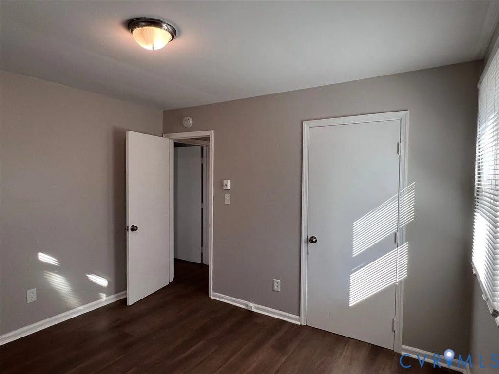 20507 Hickory Court, South Chesterfield, VA 23803 Interior room featuring wood-finish flooring, light gray walls, white trim, and a semi-flush mount ceiling light