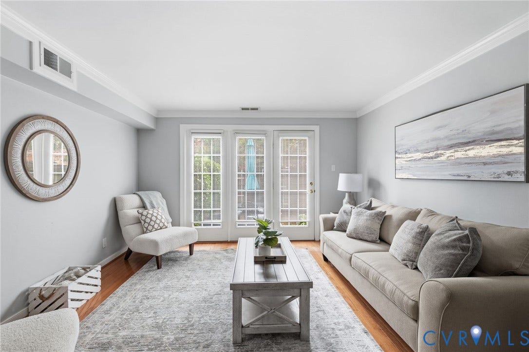 405 N Hamilton Street, #G, Richmond, VA 23221 Hardwood flooring, crown molding, and three sets of French doors provide abundant natural light