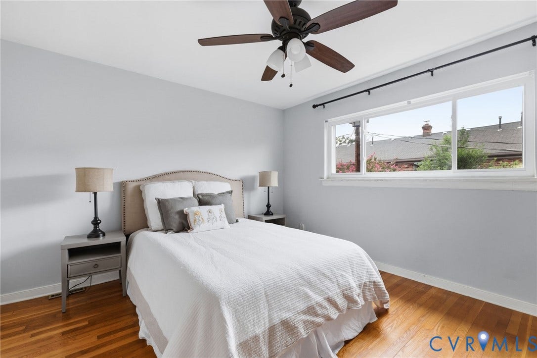 405 N Hamilton Street, #G, Richmond, VA 23221 Hardwood flooring, multi-pane window, ceiling fan with integrated lighting, light gray wall finish, and white trim
