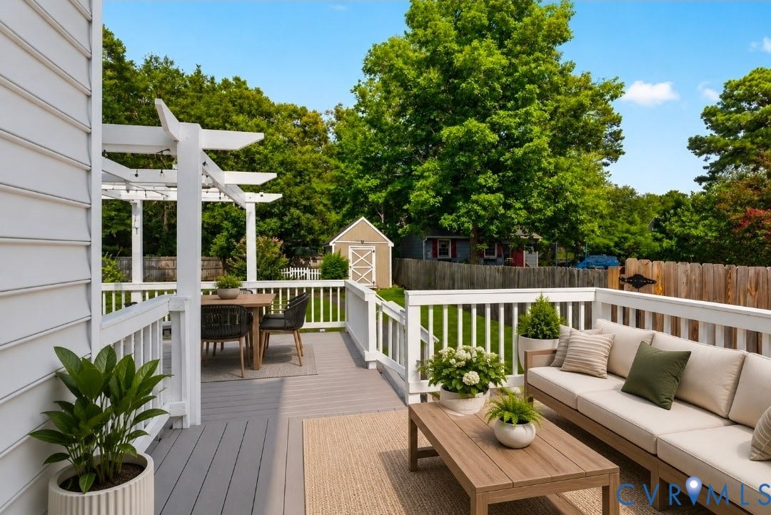 2020 Knotty Drive, Glen Allen, VA 23060 Expansive outdoor deck featuring a white pergola, white baluster railings, and a detached storage shed