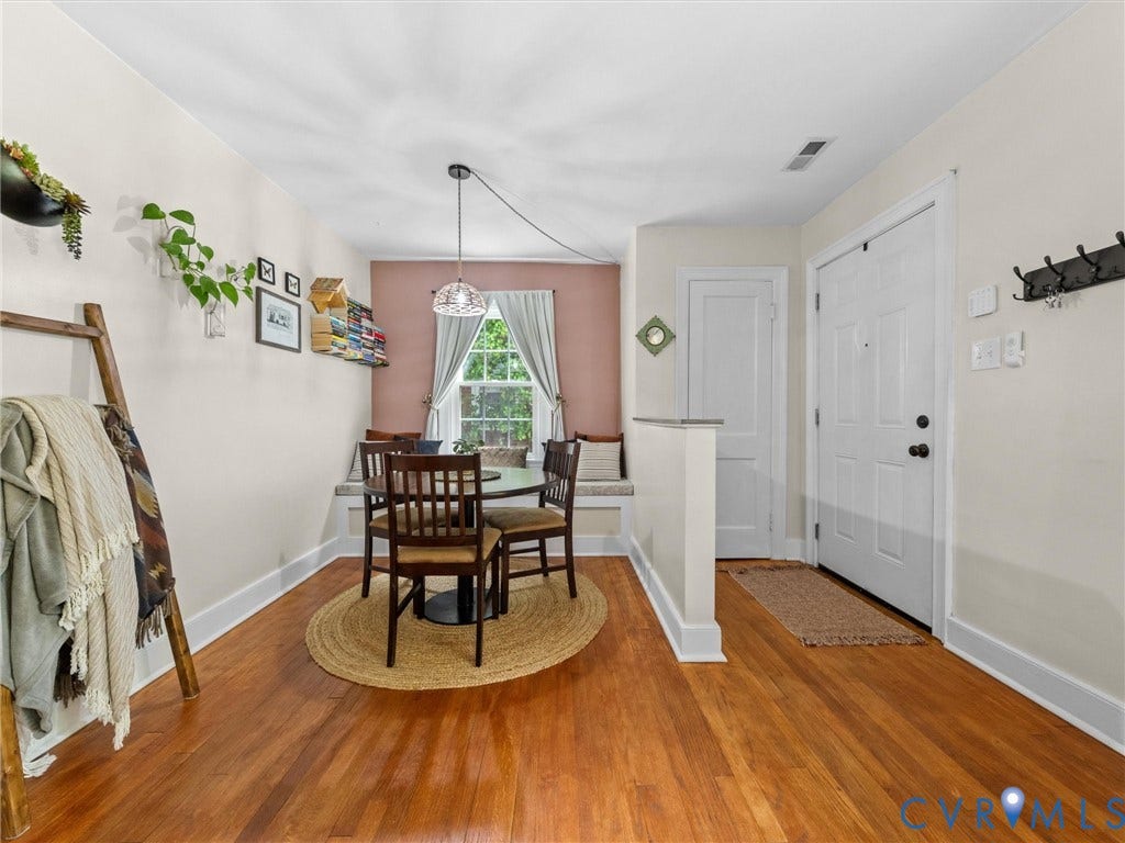 5023 E Seminary Avenue, Richmond, VA 23227 Hardwood-style flooring throughout, featuring a built-in window seat, recessed lighting, and a white paneled door