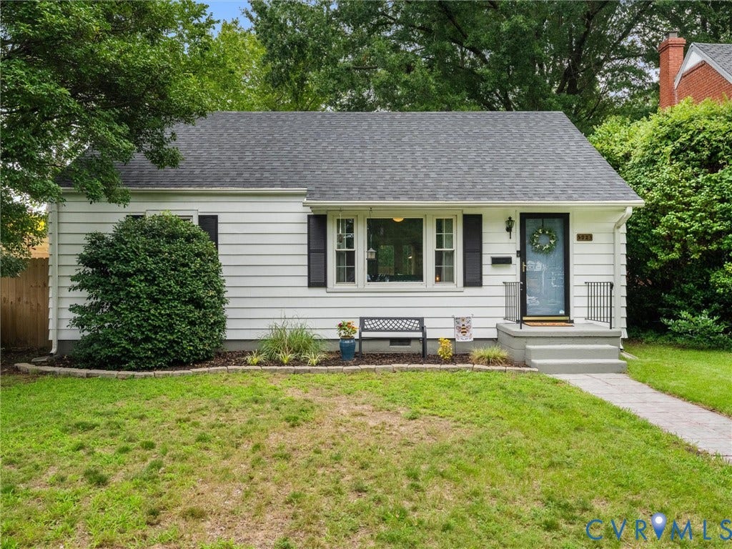 5023 E Seminary Avenue, Richmond, VA 23227 White siding exterior with black shutters and a dark gray shingle roof