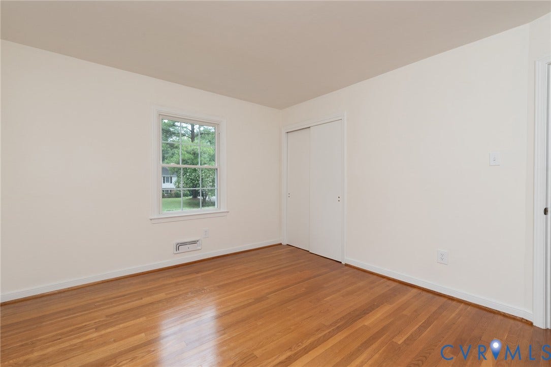 2519 Woodmont Drive, Woodmont, Chesterfield, VA 23235 Hardwood flooring extending throughout, white walls, and white trim