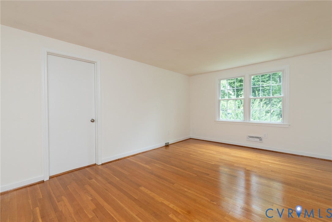 2519 Woodmont Drive, Woodmont, Chesterfield, VA 23235 Room with wood-finish flooring, white walls, and white trim