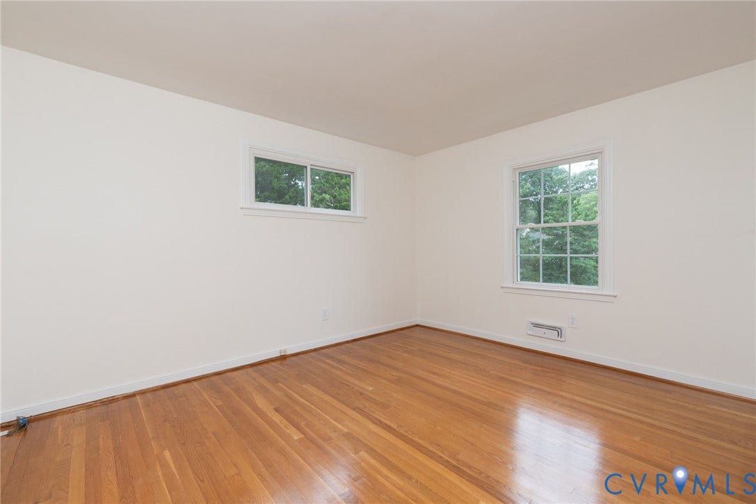 2519 Woodmont Drive, Woodmont, Chesterfield, VA 23235 Room featuring wood-finish flooring, white walls, and white trim