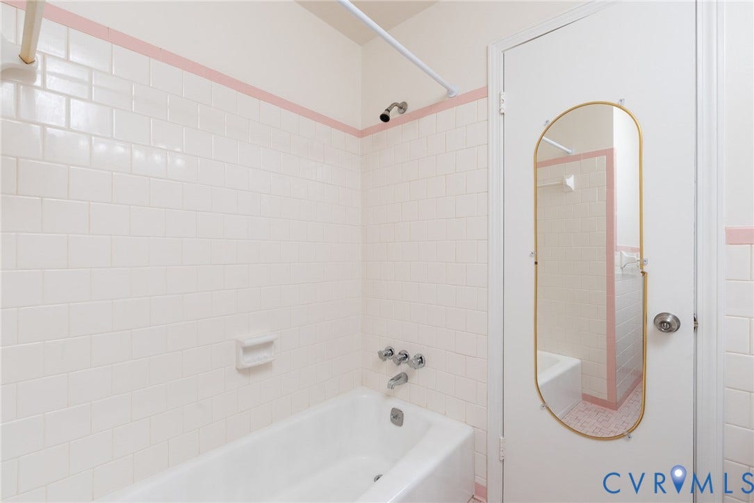 2519 Woodmont Drive, Woodmont, Chesterfield, VA 23235 White subway tile bath surround with a pink accent stripe